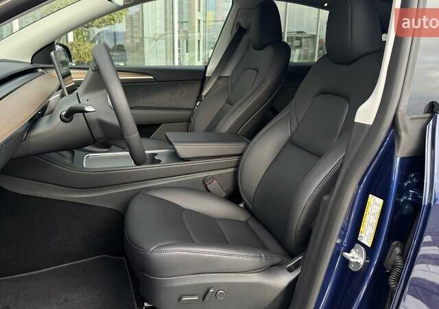 Тесла Model Y 2024 в Чернигове на Automoto.ua Синий Тесла Model Y, объемом двигателя 0 л и пробегом 6 тыс. км за 31800 $, фото 18 на Automoto.ua