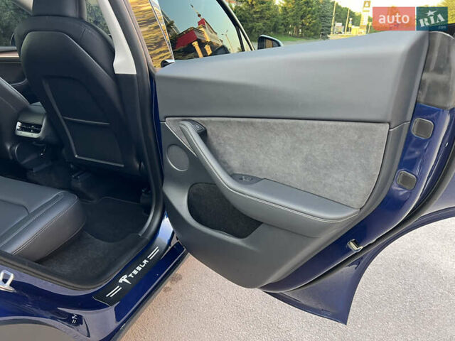 Синий Тесла Model Y, объемом двигателя 0 л и пробегом 13 тыс. км за 29500 $, фото 40 на Automoto.ua