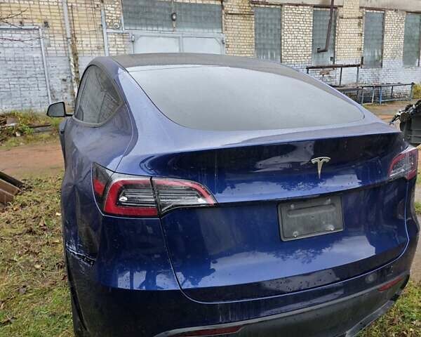 Синий Тесла Model Y, объемом двигателя 0 л и пробегом 106 тыс. км за 20400 $, фото 1 на Automoto.ua