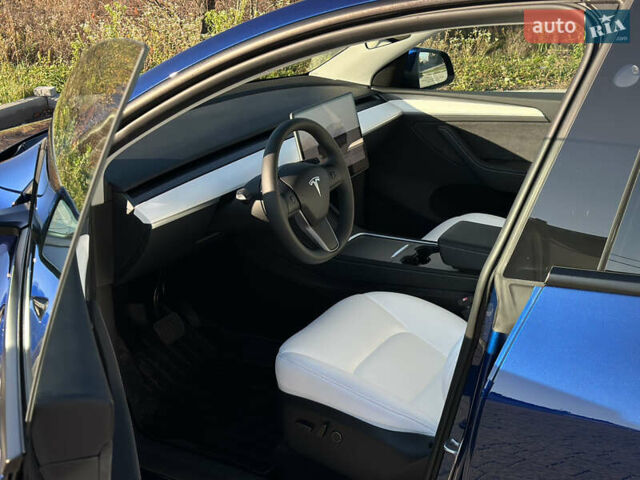 Синий Тесла Model Y, объемом двигателя 0 л и пробегом 10 тыс. км за 32500 $, фото 55 на Automoto.ua