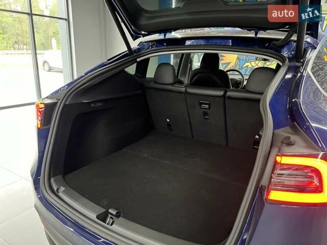 Синий Тесла Model Y, объемом двигателя 0 л и пробегом 8 тыс. км за 34199 $, фото 26 на Automoto.ua