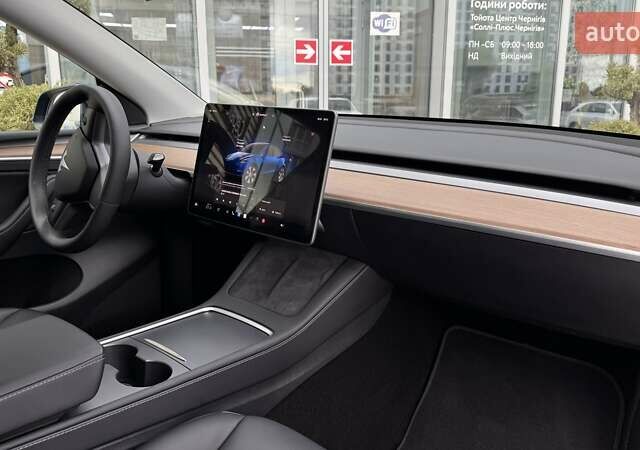 Тесла Model Y 2024 в Чернигове на Automoto.ua Синий Тесла Model Y, объемом двигателя 0 л и пробегом 6 тыс. км за 31800 $, фото 16 на Automoto.ua