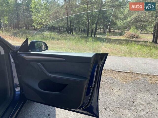 Синий Тесла Model Y, объемом двигателя 0 л и пробегом 18 тыс. км за 33500 $, фото 24 на Automoto.ua