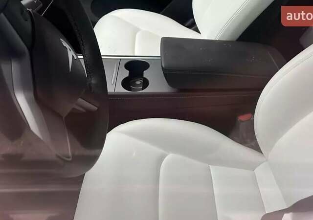 Синий Тесла Model Y, объемом двигателя 0 л и пробегом 5 тыс. км за 30500 $, фото 3 на Automoto.ua