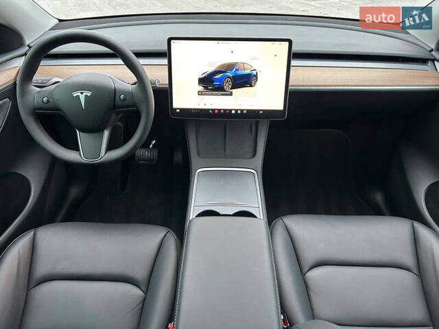 Синий Тесла Model Y, объемом двигателя 0 л и пробегом 9 тыс. км за 28900 $, фото 14 на Automoto.ua