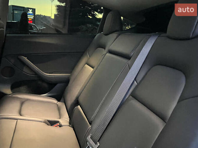 Синий Тесла Model Y, объемом двигателя 0 л и пробегом 24 тыс. км за 33850 $, фото 15 на Automoto.ua