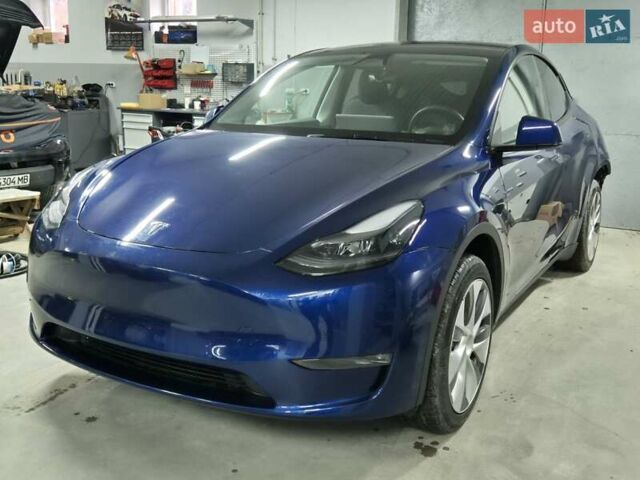 Синий Тесла Model Y, объемом двигателя 0 л и пробегом 44 тыс. км за 25000 $, фото 1 на Automoto.ua