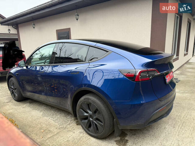 Синий Тесла Model Y, объемом двигателя 0 л и пробегом 9 тыс. км за 28900 $, фото 3 на Automoto.ua
