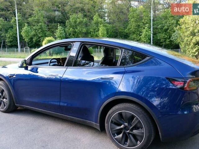Синий Тесла Model Y, объемом двигателя 0 л и пробегом 21 тыс. км за 33000 $, фото 1 на Automoto.ua