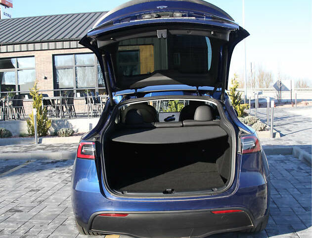Синий Тесла Model Y, объемом двигателя 0 л и пробегом 19 тыс. км за 33900 $, фото 10 на Automoto.ua