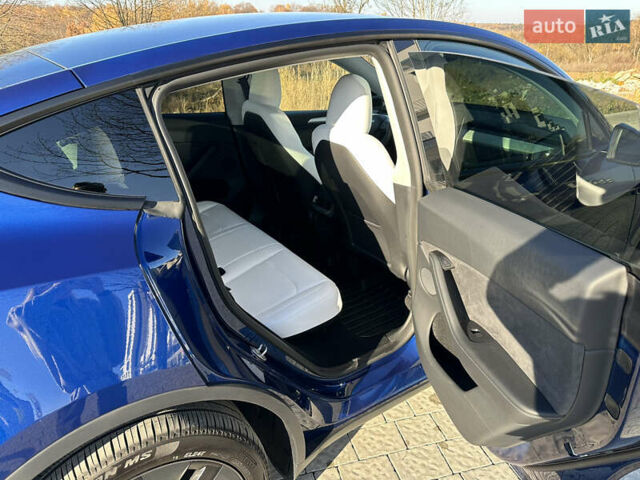 Синий Тесла Model Y, объемом двигателя 0 л и пробегом 10 тыс. км за 32500 $, фото 10 на Automoto.ua