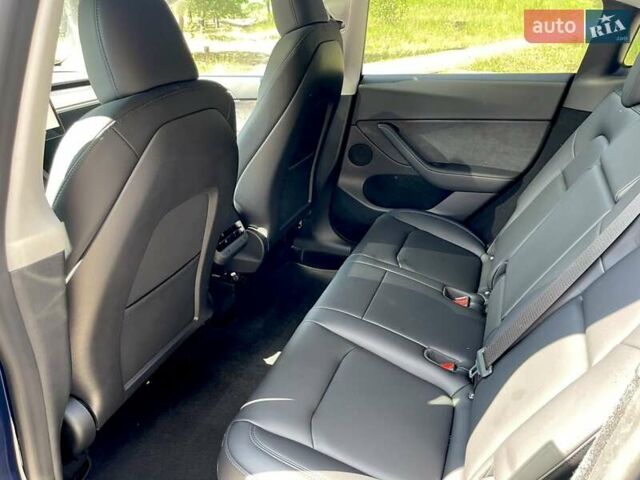Синий Тесла Model Y, объемом двигателя 0 л и пробегом 24 тыс. км за 38800 $, фото 18 на Automoto.ua