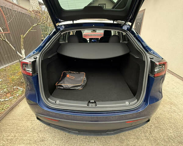 Синий Тесла Model Y, объемом двигателя 0 л и пробегом 9 тыс. км за 28900 $, фото 16 на Automoto.ua