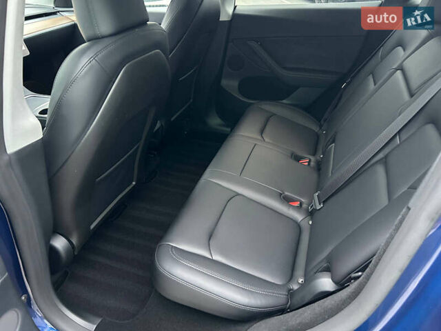 Синий Тесла Model Y, объемом двигателя 0 л и пробегом 9 тыс. км за 28900 $, фото 13 на Automoto.ua