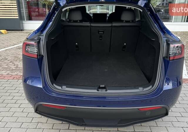 Тесла Model Y 2024 в Чернигове на Automoto.ua Синий Тесла Model Y, объемом двигателя 0 л и пробегом 6 тыс. км за 31800 $, фото 12 на Automoto.ua