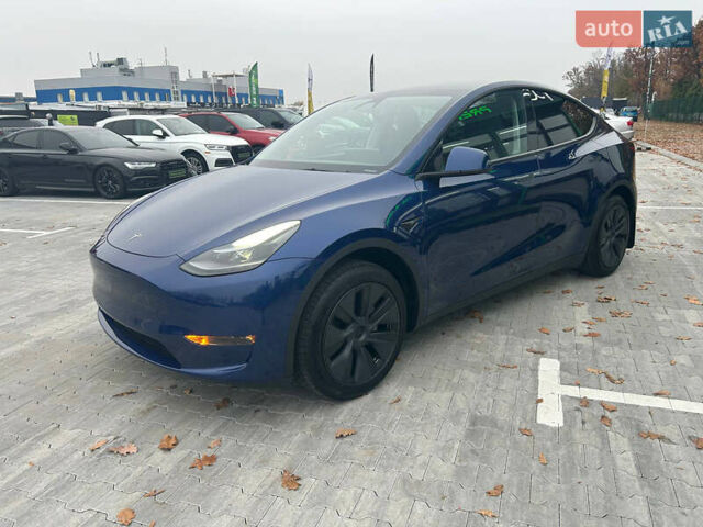 Синий Тесла Model Y, объемом двигателя 0 л и пробегом 9 тыс. км за 28900 $, фото 1 на Automoto.ua