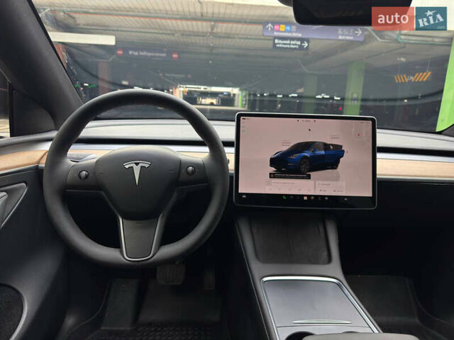 Синий Тесла Model Y, объемом двигателя 0 л и пробегом 1 тыс. км за 34000 $, фото 7 на Automoto.ua