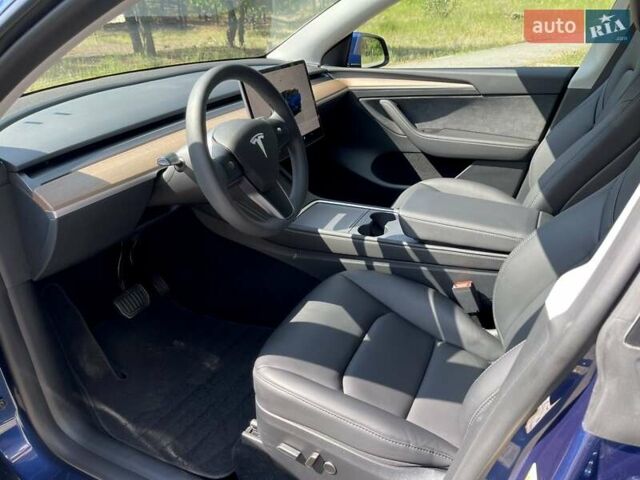 Синий Тесла Model Y, объемом двигателя 0 л и пробегом 18 тыс. км за 33500 $, фото 16 на Automoto.ua