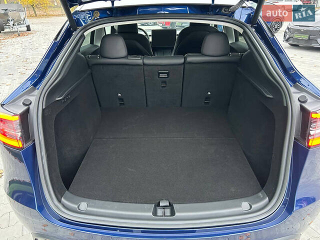 Синий Тесла Model Y, объемом двигателя 0 л и пробегом 9 тыс. км за 28900 $, фото 16 на Automoto.ua