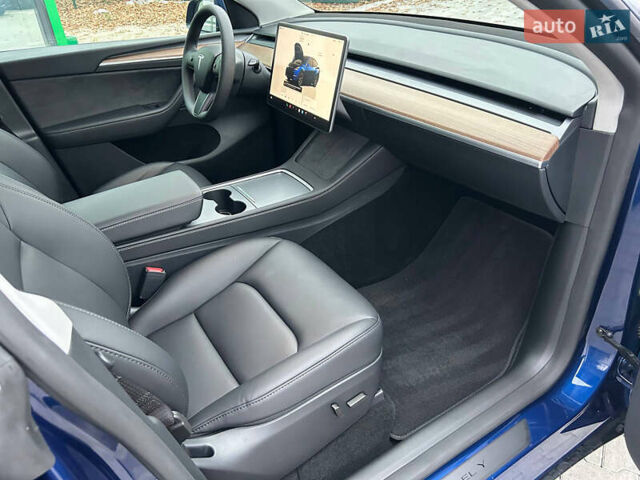Синий Тесла Model Y, объемом двигателя 0 л и пробегом 9 тыс. км за 28900 $, фото 11 на Automoto.ua
