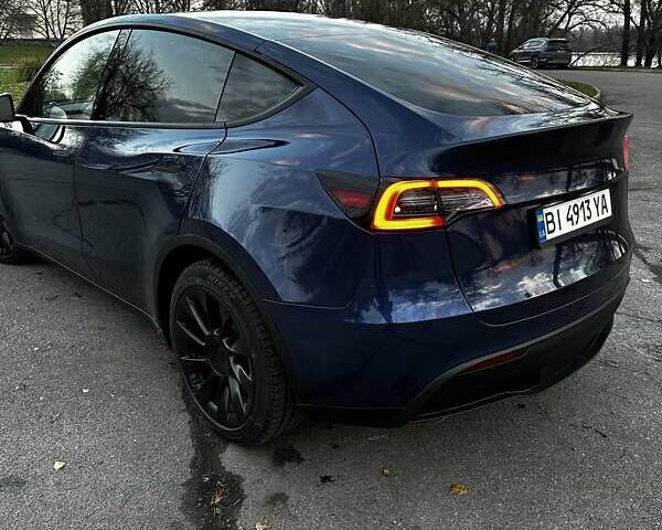 Синий Тесла Model Y, объемом двигателя 0 л и пробегом 43 тыс. км за 27500 $, фото 2 на Automoto.ua