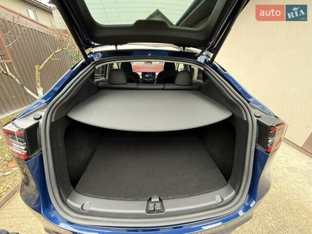 Синий Тесла Model Y, объемом двигателя 0 л и пробегом 9 тыс. км за 28900 $, фото 14 на Automoto.ua