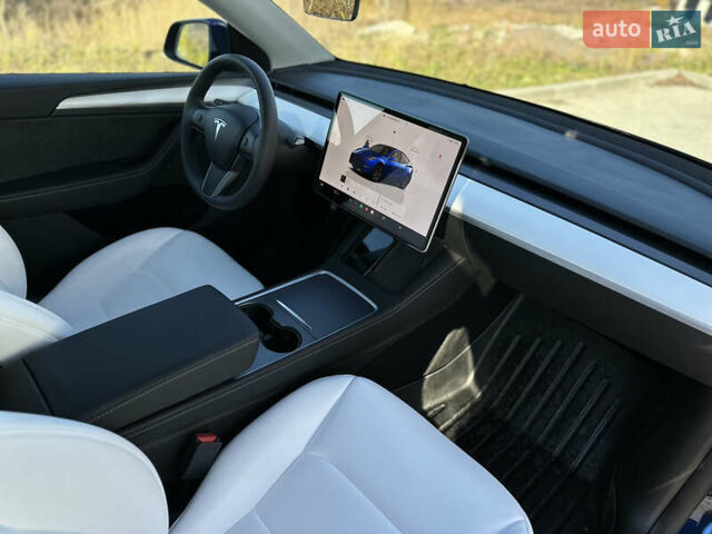 Синий Тесла Model Y, объемом двигателя 0 л и пробегом 10 тыс. км за 32500 $, фото 1 на Automoto.ua