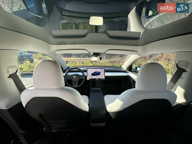 Синий Тесла Model Y, объемом двигателя 0 л и пробегом 10 тыс. км за 32500 $, фото 45 на Automoto.ua