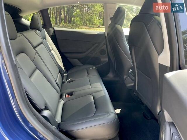 Синий Тесла Model Y, объемом двигателя 0 л и пробегом 24 тыс. км за 38800 $, фото 22 на Automoto.ua