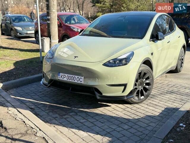 Зеленый Тесла Model Y, объемом двигателя 0 л и пробегом 110 тыс. км за 28999 $, фото 7 на Automoto.ua