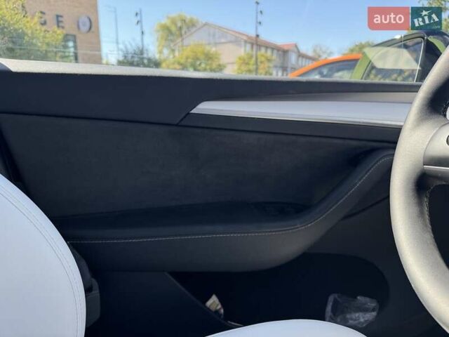 Зеленый Тесла Model Y, объемом двигателя 0 л и пробегом 11 тыс. км за 27999 $, фото 19 на Automoto.ua