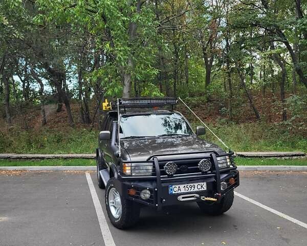 Зеленый Тойота 4Раннер, объемом двигателя 3.4 л и пробегом 268 тыс. км за 16500 $, фото 1 на Automoto.ua