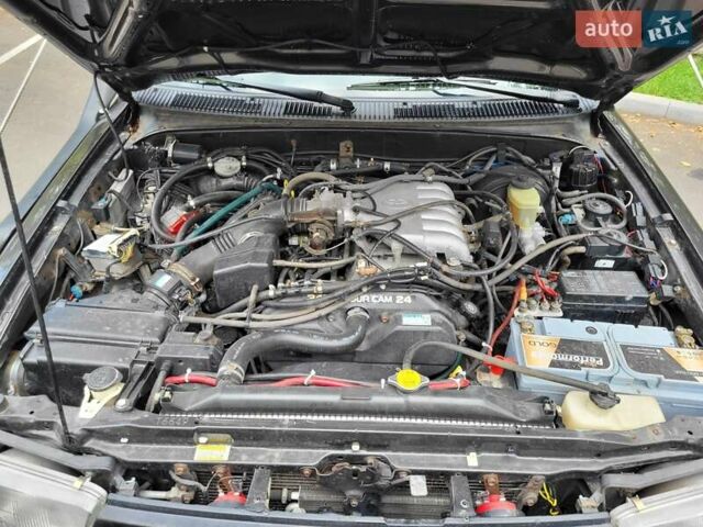 Зеленый Тойота 4Раннер, объемом двигателя 3.4 л и пробегом 268 тыс. км за 16500 $, фото 22 на Automoto.ua