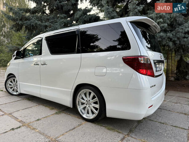Белый Тойота Алфард, объемом двигателя 2.4 л и пробегом 85 тыс. км за 14900 $, фото 4 на Automoto.ua