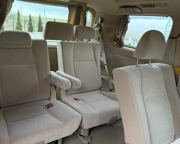 Тойота Алфард 2010 в Виннице на Automoto.ua Белый Тойота Алфард, объемом двигателя 2.4 л и пробегом 183 тыс. км за 13900 $, фото 12 на Automoto.ua