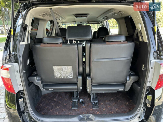 Черный Тойота Алфард, объемом двигателя 2.4 л и пробегом 78 тыс. км за 17950 $, фото 24 на Automoto.ua