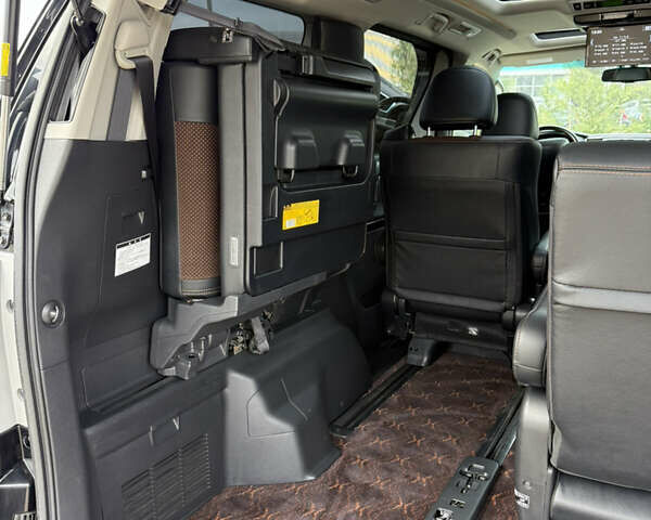 Чорний Тойота Алфард, об'ємом двигуна 2.4 л та пробігом 78 тис. км за 18800 $, фото 106 на Automoto.ua