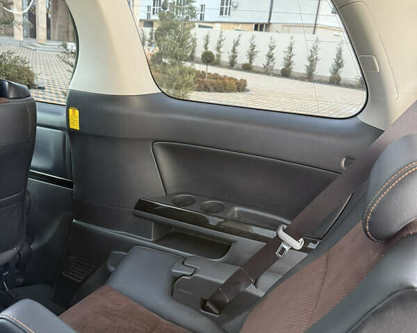 Чорний Тойота Алфард, об'ємом двигуна 2.4 л та пробігом 78 тис. км за 18800 $, фото 105 на Automoto.ua