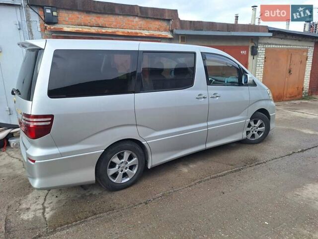 Серый Тойота Алфард, объемом двигателя 3 л и пробегом 205 тыс. км за 11000 $, фото 1 на Automoto.ua