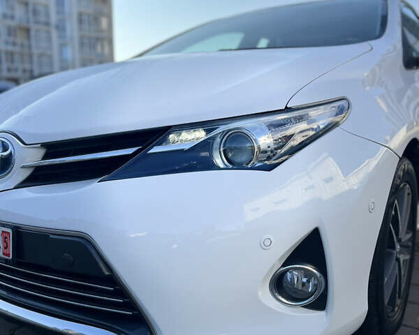 Белый Тойота Аурис, объемом двигателя 1.8 л и пробегом 226 тыс. км за 11499 $, фото 14 на Automoto.ua