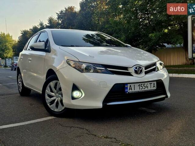 Белый Тойота Аурис, объемом двигателя 1.6 л и пробегом 97 тыс. км за 13500 $, фото 74 на Automoto.ua