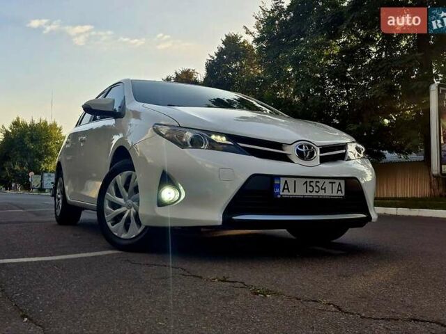 Белый Тойота Аурис, объемом двигателя 1.6 л и пробегом 97 тыс. км за 13500 $, фото 78 на Automoto.ua
