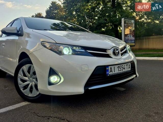 Белый Тойота Аурис, объемом двигателя 1.6 л и пробегом 97 тыс. км за 13500 $, фото 76 на Automoto.ua