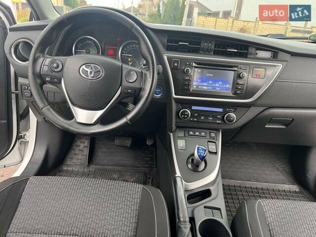 Білий Тойота Ауріс, об'ємом двигуна 1.8 л та пробігом 145 тис. км за 10900 $, фото 17 на Automoto.ua