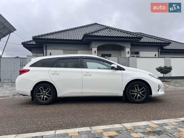 Білий Тойота Ауріс, об'ємом двигуна 1.8 л та пробігом 145 тис. км за 10900 $, фото 5 на Automoto.ua