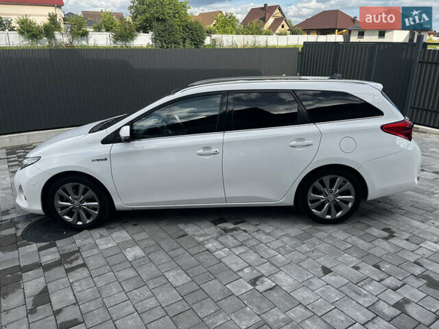 Білий Тойота Ауріс, об'ємом двигуна 1.8 л та пробігом 241 тис. км за 13599 $, фото 7 на Automoto.ua
