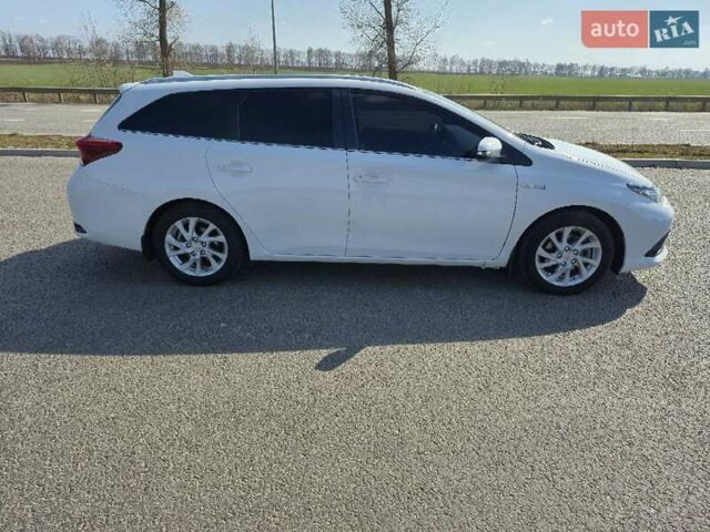 Белый Тойота Аурис, объемом двигателя 1.8 л и пробегом 97 тыс. км за 15150 $, фото 8 на Automoto.ua