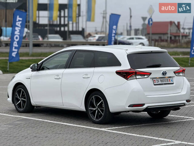 Белый Тойота Аурис, объемом двигателя 1.8 л и пробегом 200 тыс. км за 15900 $, фото 3 на Automoto.ua