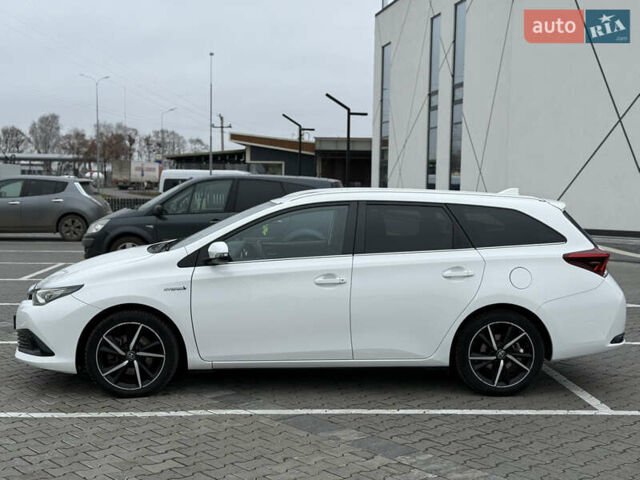 Белый Тойота Аурис, объемом двигателя 1.8 л и пробегом 200 тыс. км за 15700 $, фото 2 на Automoto.ua