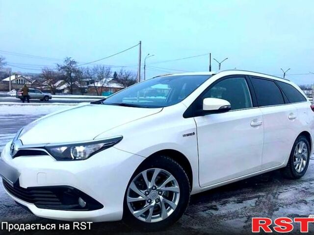 Белый Тойота Аурис, объемом двигателя 1.8 л и пробегом 98 тыс. км за 16800 $, фото 2 на Automoto.ua